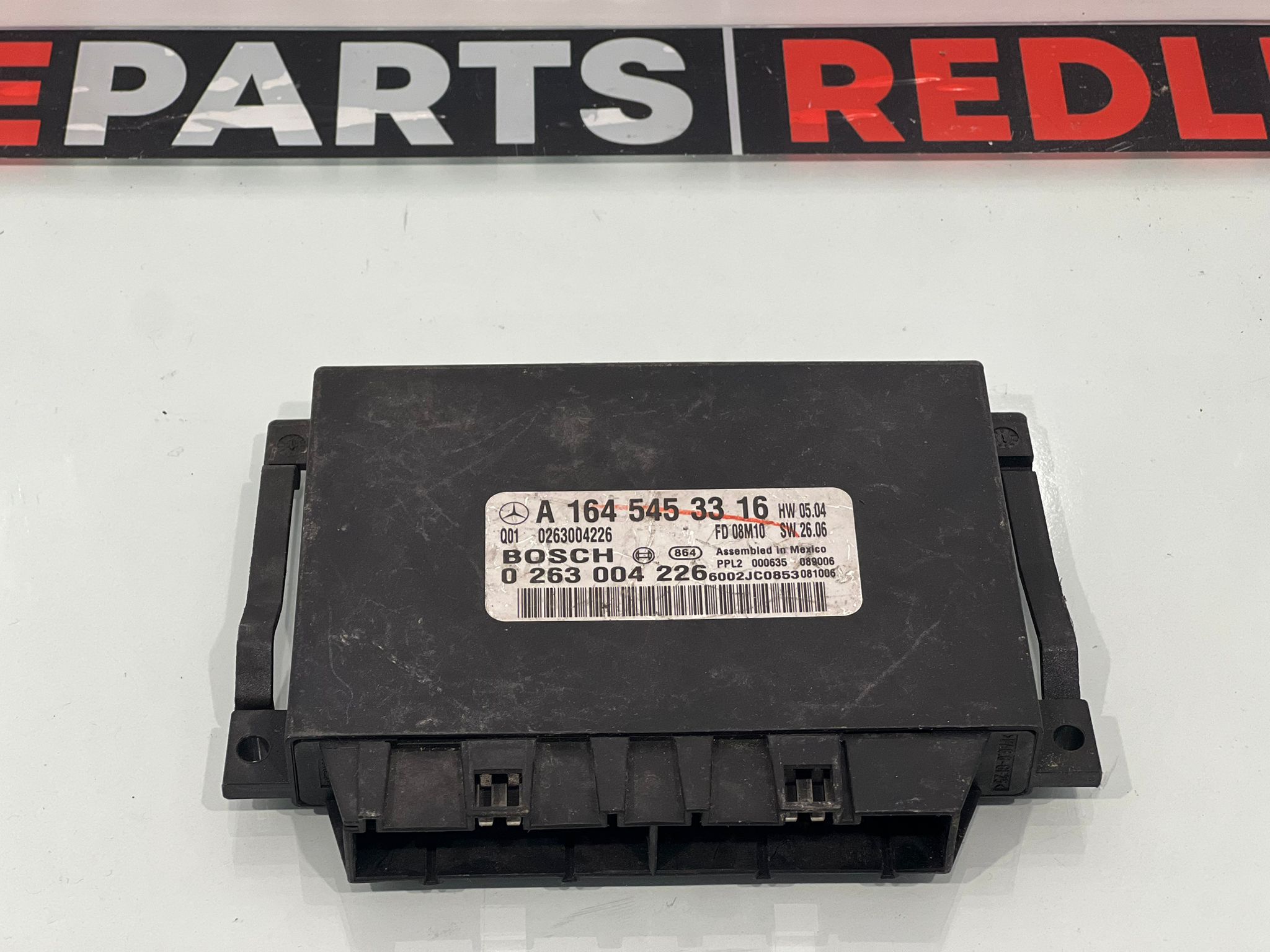 Mercedes W164 ML Park Sensör Beyni – Parça No: A1645453316. Orijinal park sensör kontrol modülü. 🔹 Resim Kısa Açıklaması
